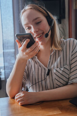 audio app on appstore with headphones. Clubhouse drop in audio chat application view on the...