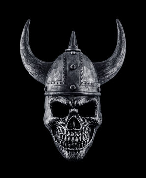 Human skull with viking horned helmet isolated on black