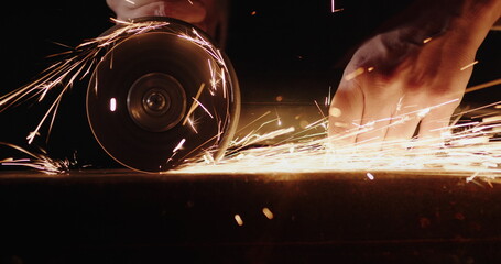 Metal treatment by grinding circle, welder grinds welds