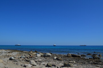 Fototapeta na wymiar Ships near the coast of Chrissi island