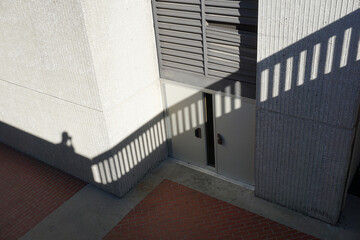 Urban building and shadows creating abstract design