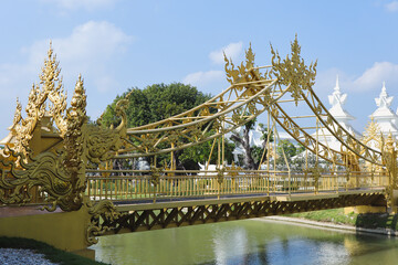 Golden sculpture at Wat Rong Khun or White Temple, Chiang Rai, Thailand.
