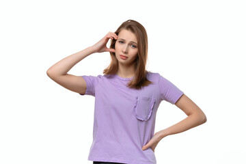 Photo of thinking young woman with blonde straight hair in casual clothes. Concept of thinking. Be smart and think