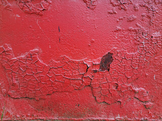texture old red painted metal plate nailed rusting and crumbling