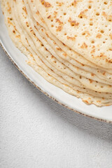 Stack of pancakes on Shrovetide close-up