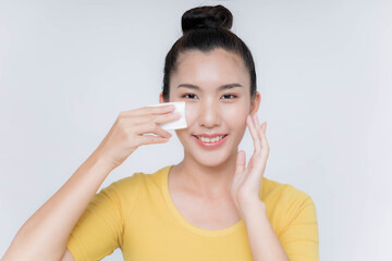 Asian women are doing facial cleansing.