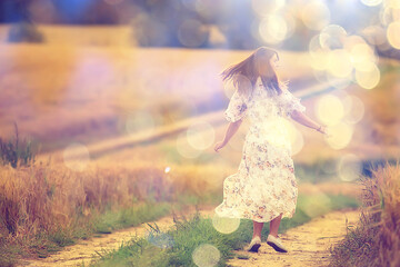 happy girl freedom in summer field, glare of the sun abstract background france provence autumn