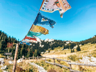Tibetan flags in the mountains of Velebit National Park in Croatia