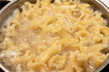 Cooking pasta in a saucepan