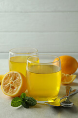 Concept of dessert with lemon jelly on white textured table