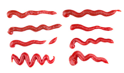 Ketchup splashes, group of objects. Arrangement of red ketchup or tomato sauce, isolated white...
