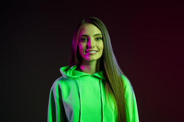 Photo of young attractive woman wear hoodie party long hair isolated on dark gradient color background