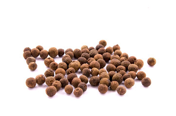 Pile of allspice isolated on white background.