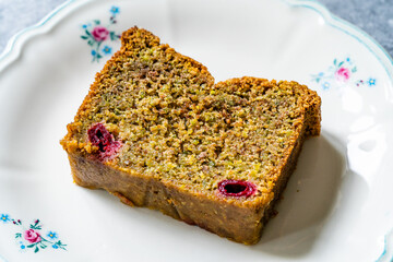 Homemade Pistachio Cake Slice with Sour Cherry.