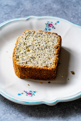 Homemade Lemon Cake Slice with Poppy Seeds served in Plate.