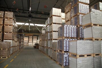 Industrial equipment for the production of laminate. Furniture factory production line. Laminated flooring. The factory for the production of laminate.