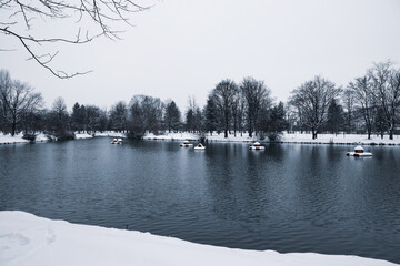 Scenic view of lake in snow winter; nature background.