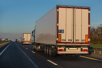 Trucks semi-trailers moving on highway