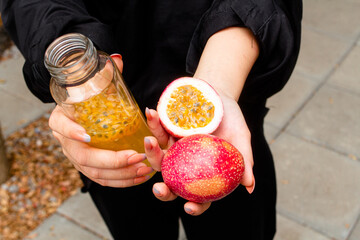 Passion fruit in hands