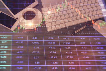 Double exposure of forex chart hologram over desktop with phone. Top view. Mobile trade platform concept.