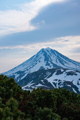 Naklejka premium snowy volcano in summer