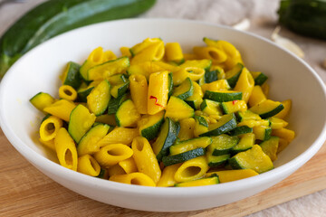 Pasta with zucchini and saffron. Ideal for a fast lunch. Vegetarian dish.