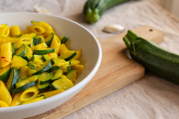 Pasta with zucchini and saffron. Ideal for a fast lunch. Vegetarian dish.
