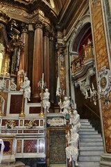 Fototapeta na wymiar Napoli – Scala destra dell'altare della Chiesa del Gesù Vecchio