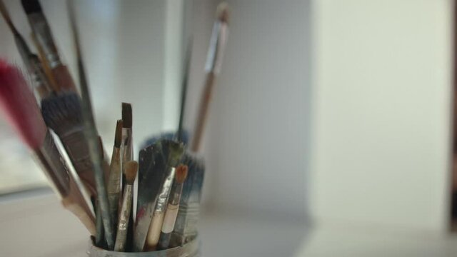 Artist's brushes slide close up shot