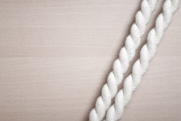 braided rope on wood background