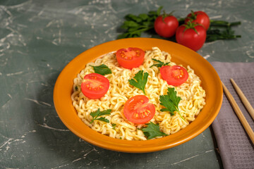 Asian food. Noodles with tomatoes and herbs
