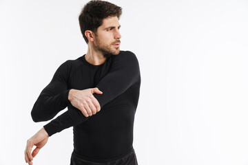 Young athletic sportsman doing exercise while working out