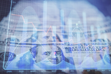 Obraz na płótnie Canvas Double exposure of forex graph drawing over us dollars bill background. Concept of financial markets.