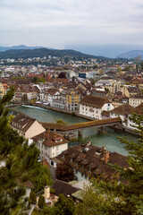 Fototapeta na wymiar Top view of Lucerne city from Little Man Tower (Switzerland). European architecture. Lucerne lake.