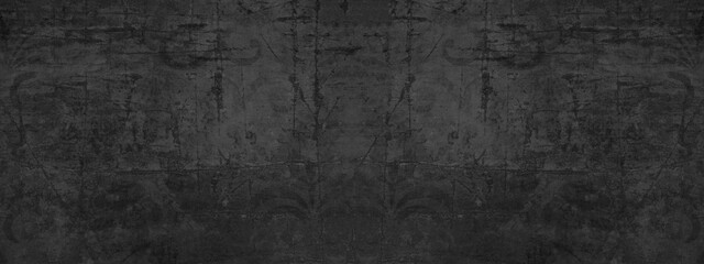 Obraz na płótnie Canvas Old black anthracite gray vintage worn shabby patchwork motif tiles stone concrete cement wall texture background banner