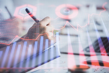 Double exposure of forex graph drawing over people taking notes background. Concept of financial...