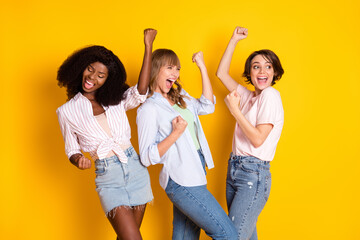 Photo of nice hooray three ladies yell wear white shirt isolated on bright yellow color background