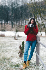 Woman at winter outdoors - 417814970