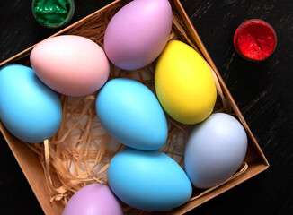 Coloring Easter eggs in different colors and patterns