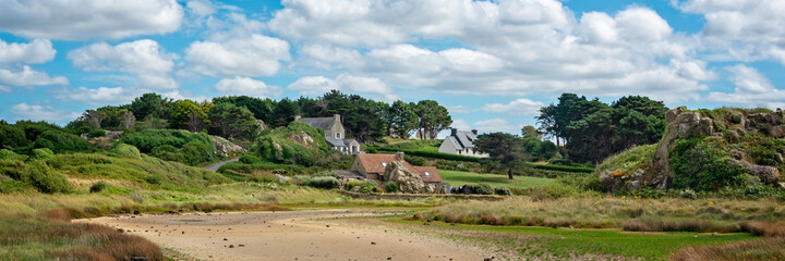 Scenic panoramic landscape with houses and rocks at Pors Hir, Côtes d'Armor, Brittany, France