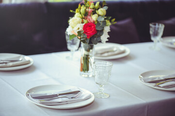 Luxurious floral arrangement of pink and white flowers fixed on the wall