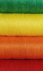 Hilos arcoiris colores calido costura manualidades