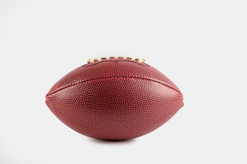 Leather american football on white background. Sports background for product display, banner, or mockup