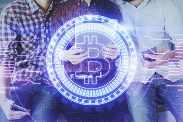 Double exposure of crypto theme drawing and man and woman working together holding and using a mobile device. Blockchain concept.