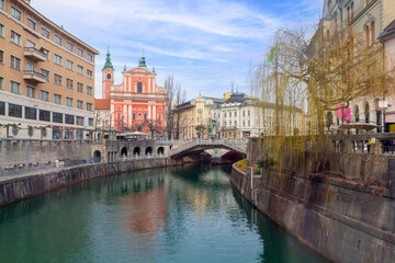 Fototapeta na wymiar Ljubljana city centre at autumn in Slovenia with river Ljubljanica.