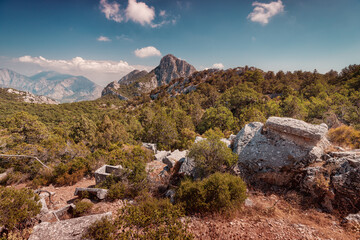 Destroyed greek tombs and ancient burials in ancient city of Termessos in Antalya province in Turkey. Famous tourist and archaeology spot