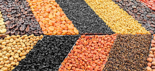 Dried fruits assortment on a market counter