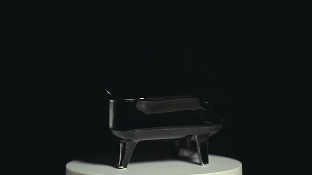 footage of piano dark background