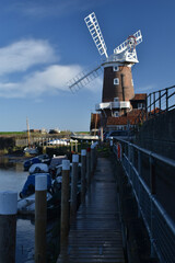 Fototapeta na wymiar Cley Mill on a bright, sunny day. North Norfolk, UK