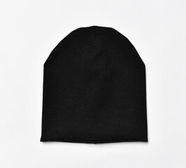 Modern knitted black beanie hat, knitwear isolated on white background